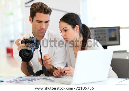Work meeting in photo agency