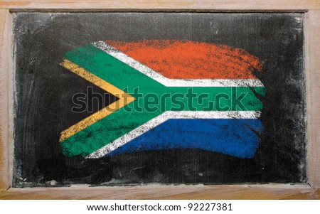 Chalky South african republic flag painted with color chalk on old blackboard