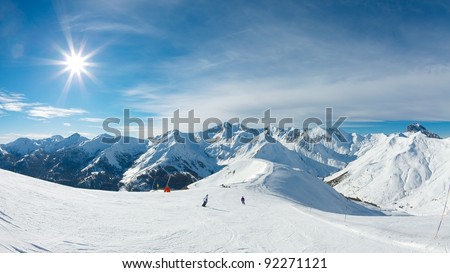 Ski slope in the mountains Royalty-Free Stock Photo #92271121