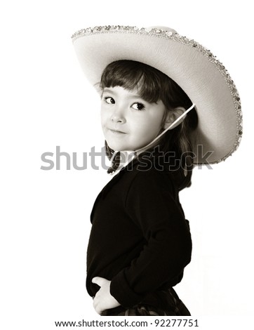 adorable cowgirl in black and white. isolated in white