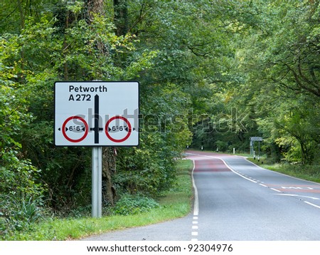 Road sign by A272 country road in England