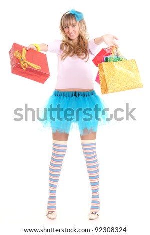 portrait of a nice girl in funny socks with holiday bags