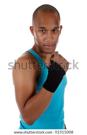 Young attractive African American man athlete wearing a wrist brace,  bandaged. White background. Studio shot.