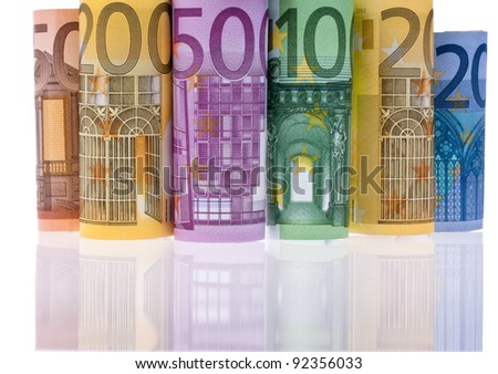 many euro banknotes in front of white background