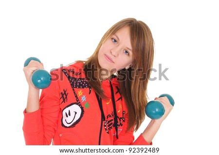 girl with dumbbells, standing on a white background