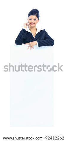 Happy smiling young business woman showing blank signboard, isolated over white background