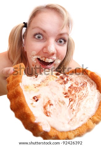 Funny picture of overweight woman eating sweet cream cake.