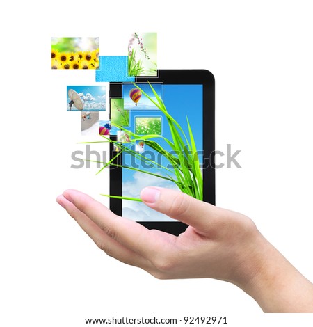touch pad PC and streaming images virtual buttons on women hand
