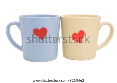 Two cups with hearts isolated