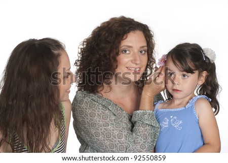 portrait of a three happy girls smiling