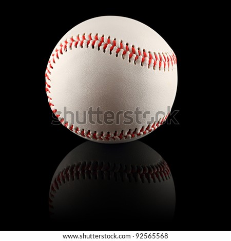 an baseball in front of black background