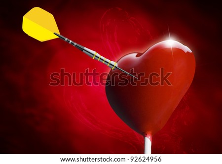 Heart-shaped lollipop hit by an arrow for the Valentines day