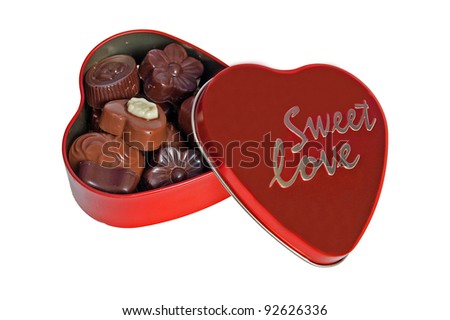 Heart filled with chocolate on a white background on the occasion of Valentine's Day