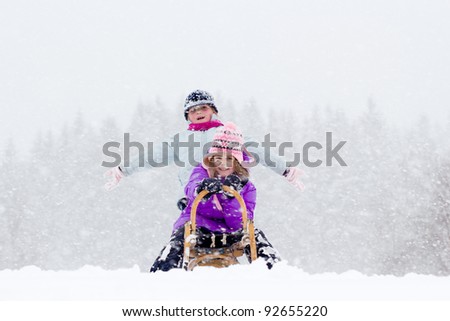Happy children in snowy time