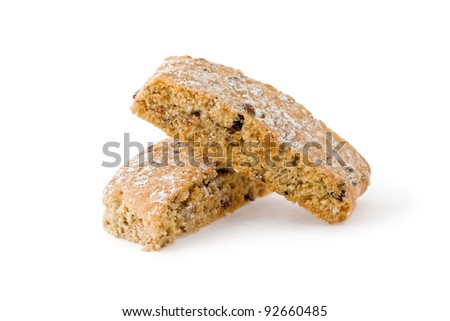 Two stacked pieces of jewish twice-baked almond cookies similar to biscotti against a white background. Royalty-Free Stock Photo #92660485