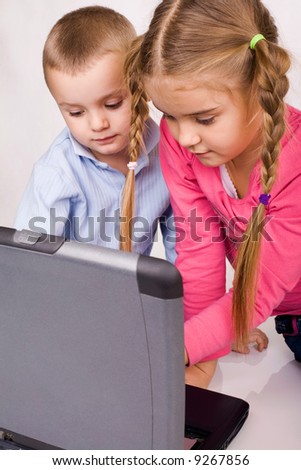 kids playing computer games or learning on line