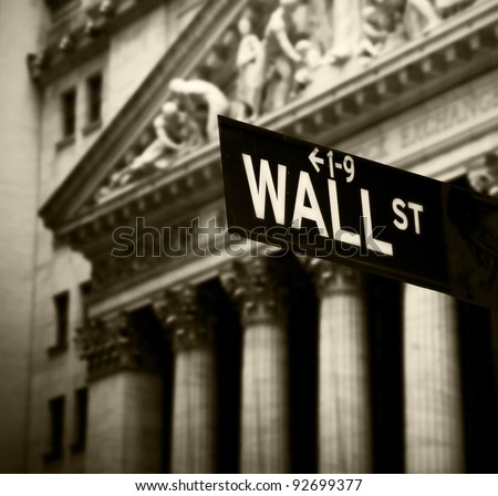Wall Street sign in lower Manhattan New York Royalty-Free Stock Photo #92699377