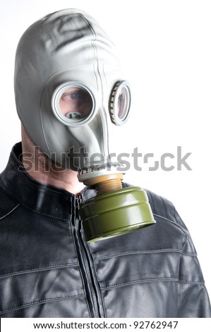 Men wearing a biker jacket and gas mask symbolizing danger in the environment