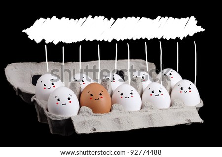 happy group of eggs with copyspace over their head