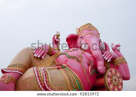 Ganesh idols are pink in the background clean.