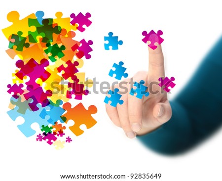  hand touching abstract puzzle piece