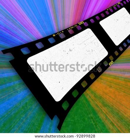 Filmstrip on colorful ray background