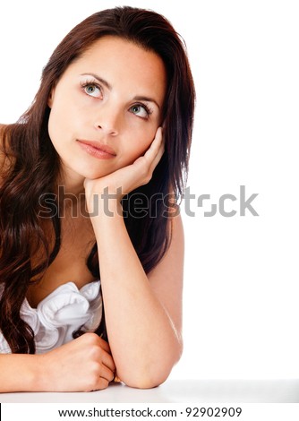 Beautiful pensive woman - isolated over a white background
