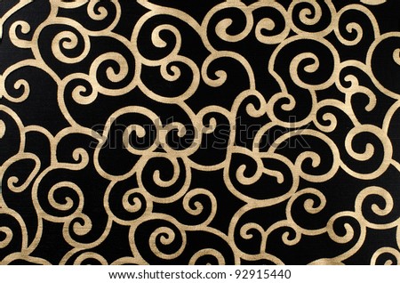 Golden abstract seamless arabesque  on black background.