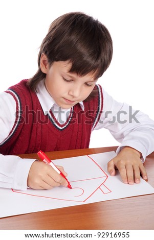 young boy drawing house isolated on white
