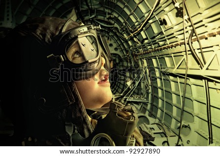 Young aviator looking at enemy planes