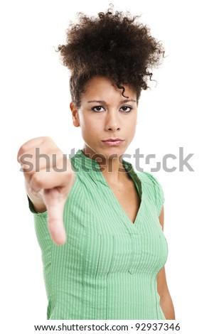 Beautiful african woman giving thumbs down. Studio shot with isolated white background.