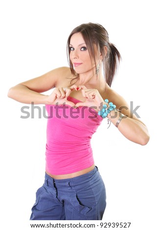 Cute girl making a heart shape sign with her hands