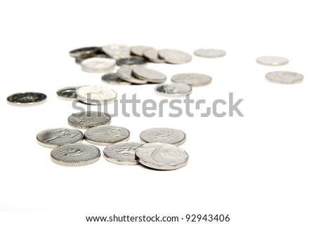 group of silver coins on white background