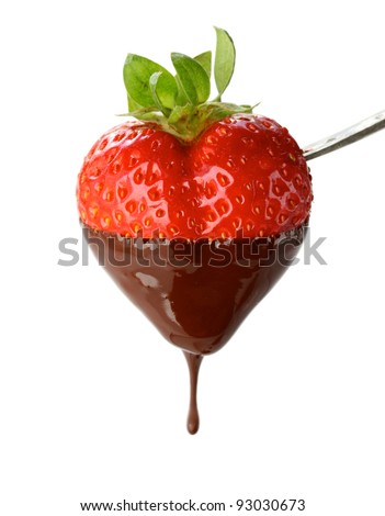 a heart shaped strawberry dipped in chocolate fondue, valentine's day