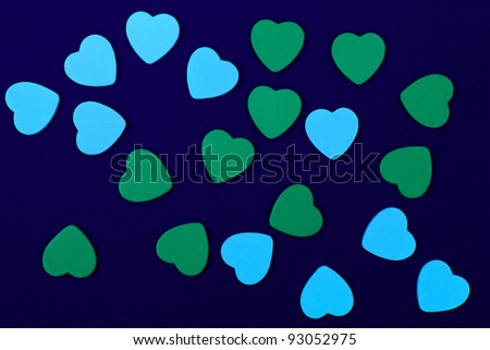blue and green hearts on dark blue background