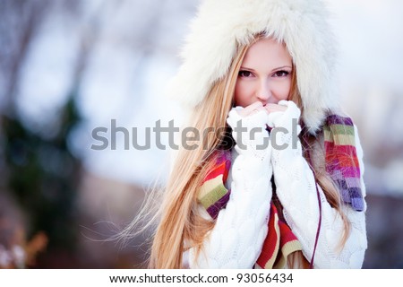 Beautiful blond hair girl i winter clothes