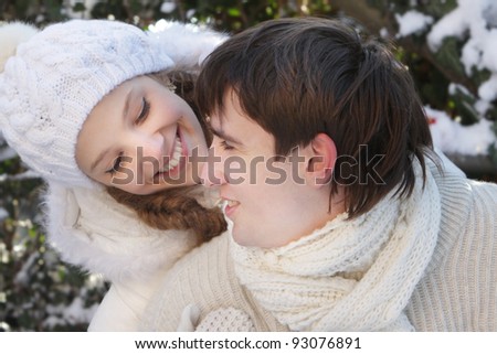 young happy couple on natural background