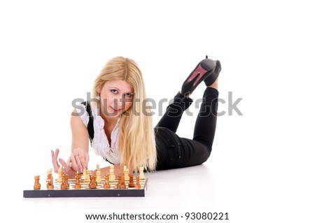cute blonde playing chess on a white