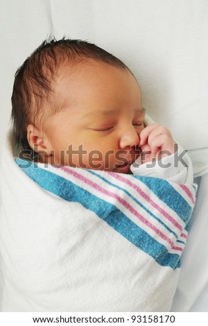 Newborn Infant Baby sleeping wrapped in blanket Royalty-Free Stock Photo #93158170