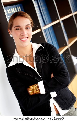 business woman portrait smiling in an office
