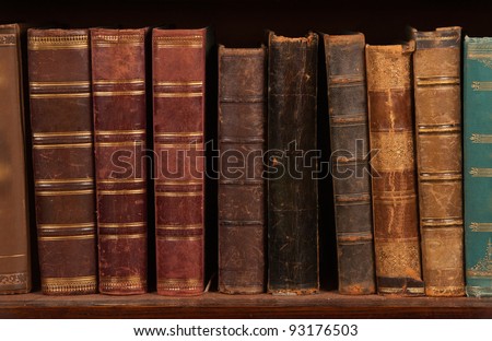 Antique books on bookshelf Royalty-Free Stock Photo #93176503