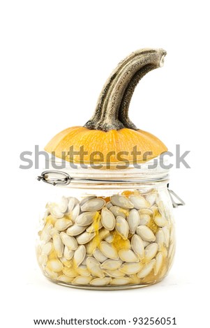 pumpkin seeds in glass jar