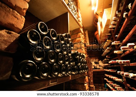 Wine cellar in small french restaraunt Royalty-Free Stock Photo #93338578