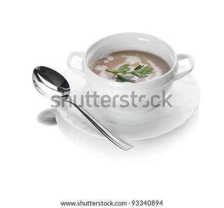 bowl of onion pureed soup with parsley