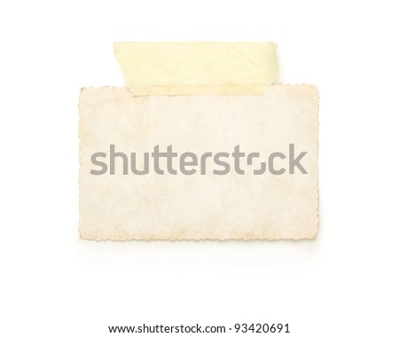 Blank old photo with adhesive tape isolated on white background
