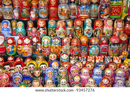 Colorful Russian nesting dolls at the market. Royalty-Free Stock Photo #93457276