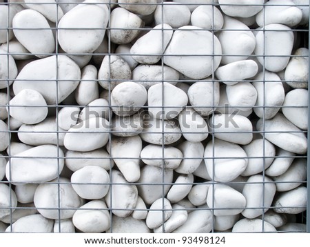 gravel in a metallic basket