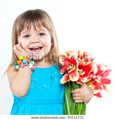 Picture of litlle girl with tulips in hands over white