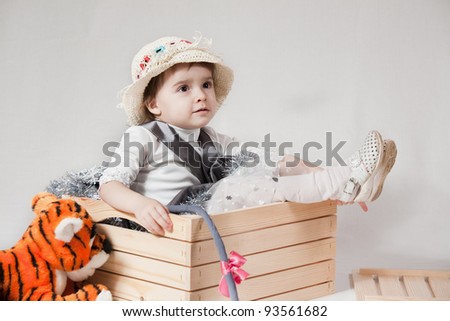 girl playing in the box