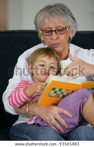 Grandma and child reading together